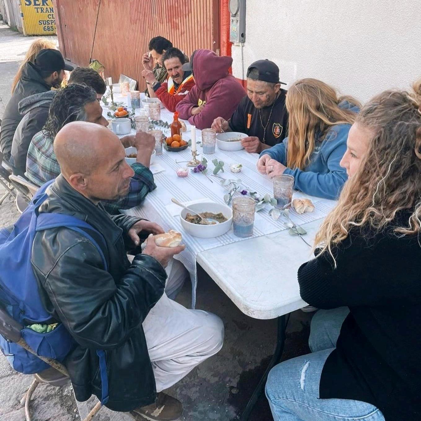 Sharing a meal and God's love with locals.